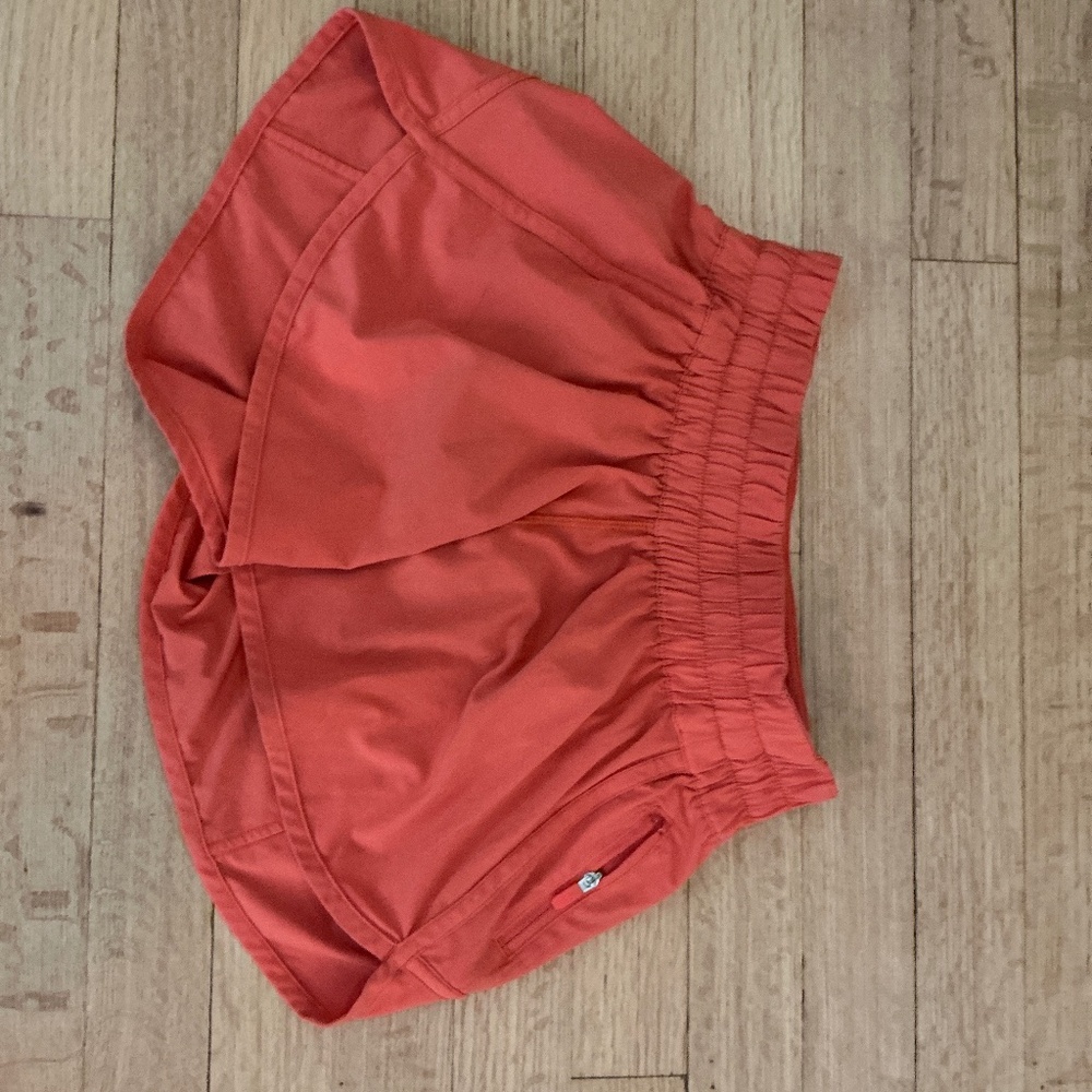 Women’s orange Lululemon shorts